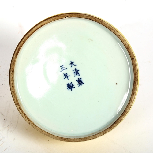 156 - A Chinese yellow glaze porcelain inkwell bottle, 6 character mark on base, height 10cm