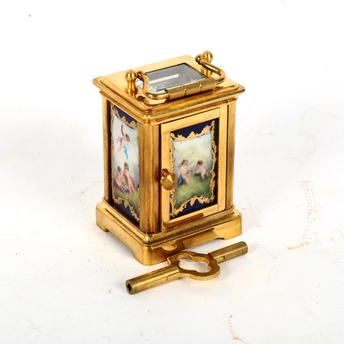 159 - A reproduction miniature brass-cased carriage clock, height 6cm