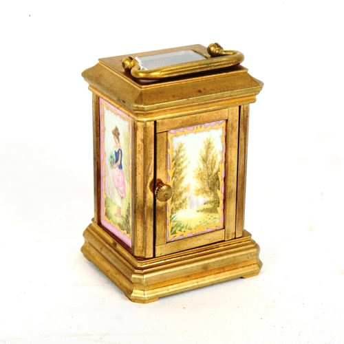 160 - A reproduction miniature brass-cased carriage clock, height 7cm