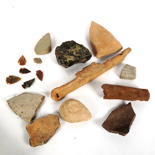 169 - Various Antiquities and artifacts, including flint arrowheads, oil lamps, pottery fragments etc (box... 