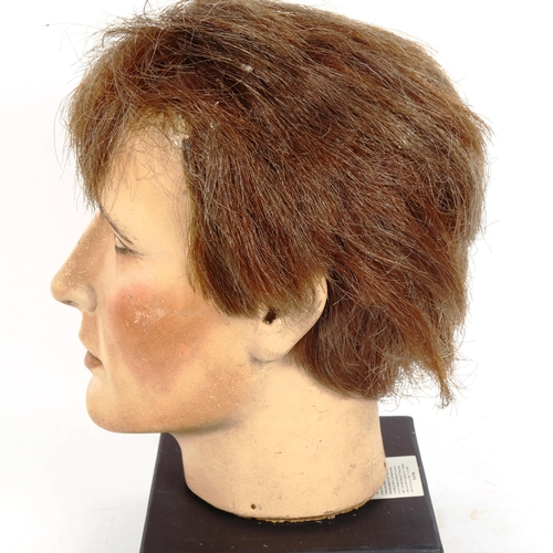 180 - A hand painted composition mannequin head, by Sperling Models Ltd