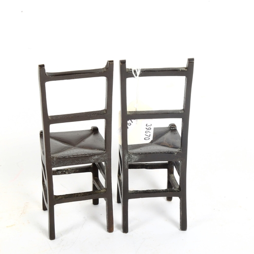 183 - A pair of patinated bronze miniature dining chairs, height 19cm