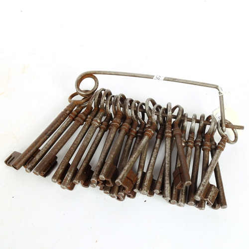 188 - A quantity of Antique steel keys