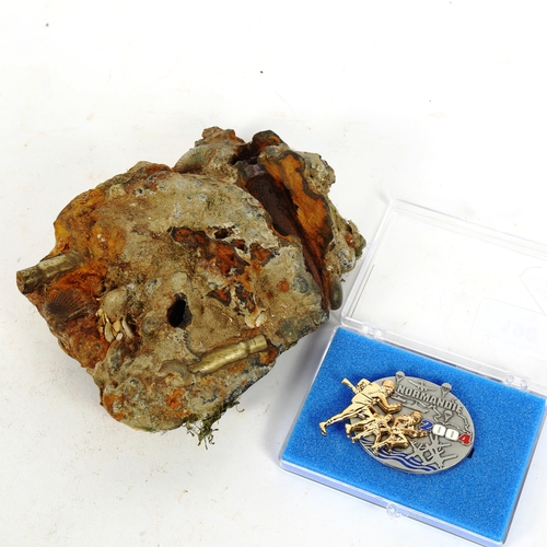 190 - Omaha Beach rock fragment, and Normandy Veteran's medal (2)