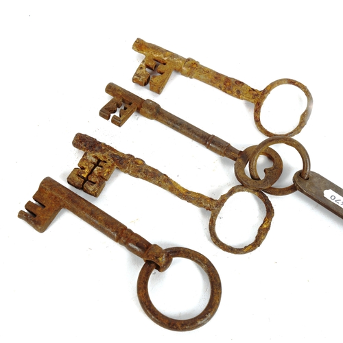 196 - 4 Antique steel keys