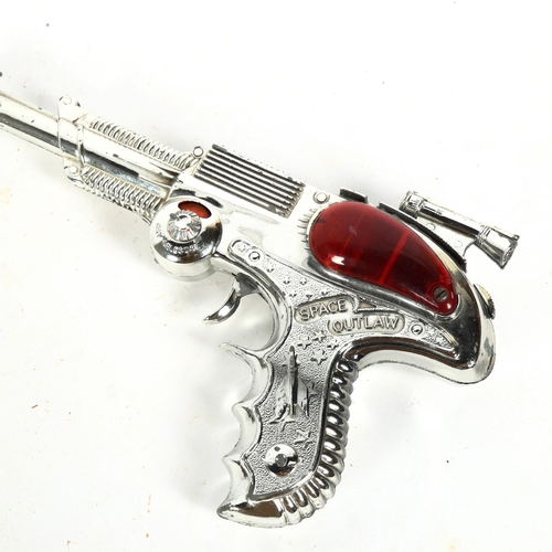 210 - A novelty Space Outlaw cap gun