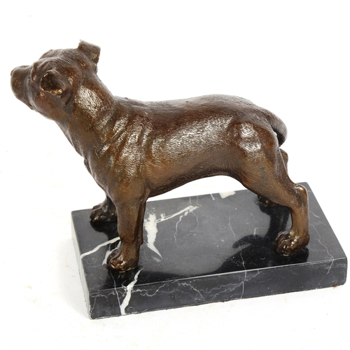 220 - A patinated bronze figural dog sculpture, on veined black marble base, height 13cm