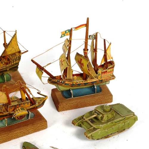 223 - A group of miniature printed card ships and vehicles, including Ark Royal, tank etc