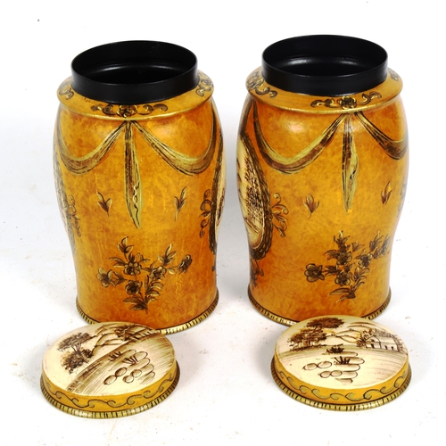 226 - A pair of reproduction painted and gilded tea caddy canisters, height 17cm