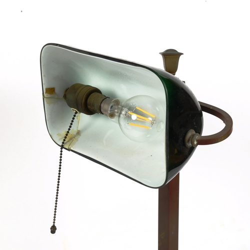 230 - A brass and green glass swivel desk lamp, height 46cm (shade broken and re-glued)