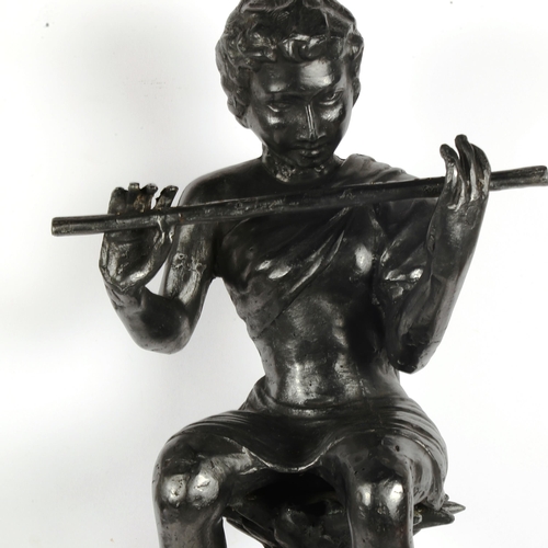 232 - A large silvered brass figural flautist sculpture, height 75cm