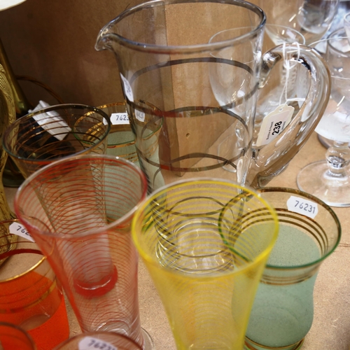 238 - Various decorative drinking glasses, and a similar jug