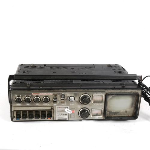 304 - A Vintage Sharp 5P-27H radio cassette TV