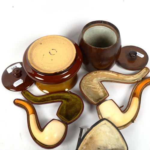 369 - 3 leather-cased Meerschaum pipes, and 2 tobacco jars