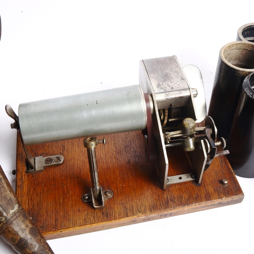 375 - An oak-cased wind-up wax cylinder player, with original tin horn