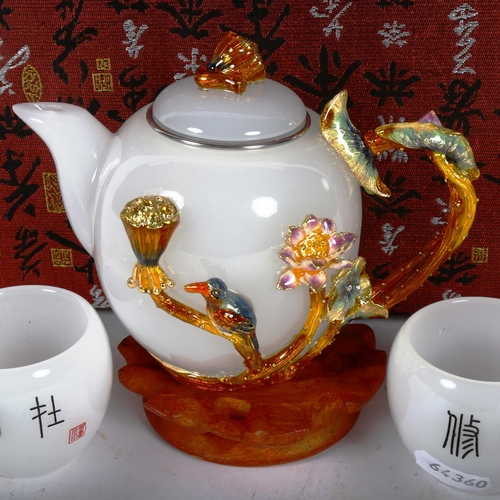 379 - A modern Japanese opaline glass and enamel tea set, comprising teapot and 6 cups, boxed