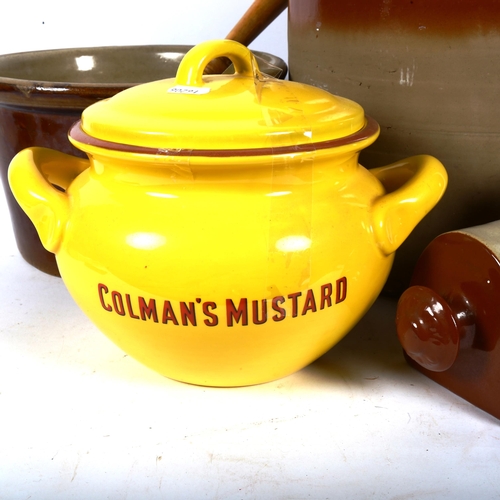 384 - A large stoneware jar and cover, foot warmer, Coleman's Mustard jar and cover etc