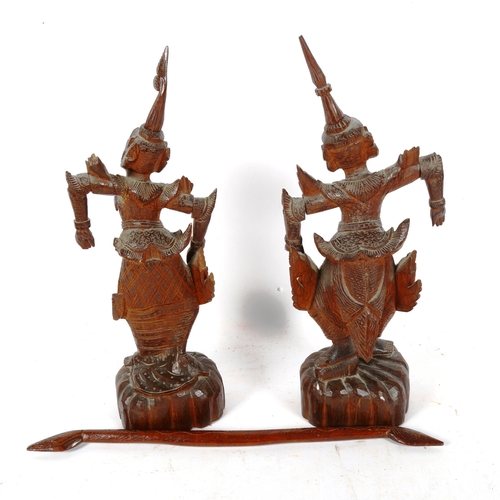 393 - A pair of Eastern carved hardwood figural dancers, height 40cm