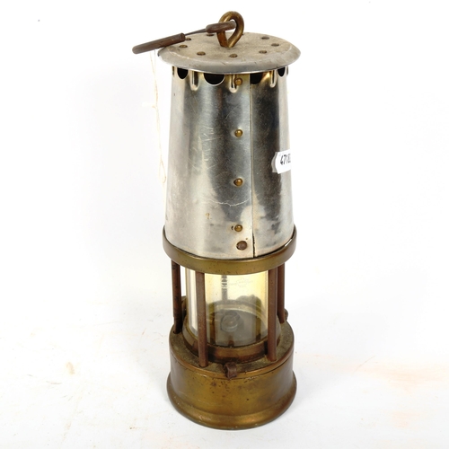 399 - A silver plated brass Protector Lamp & Lighting Co Ltd miner's lamp, height 23cm