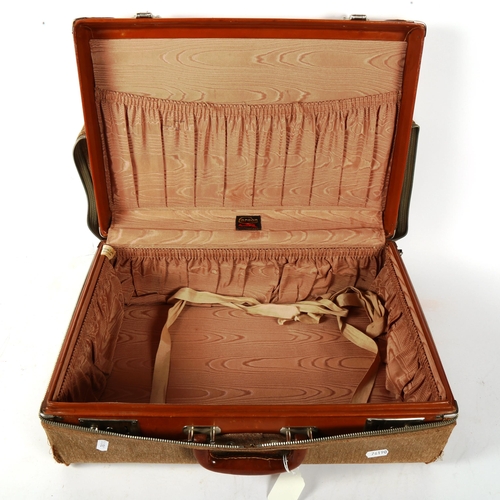 409 - A Carson tan leather luggage case with canvas cover, width 47cm