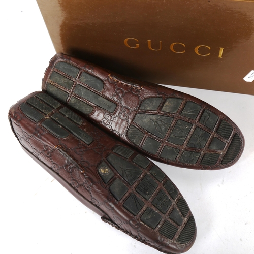 65 - GUCCI - a pair of near-new chocolate leather soft Guccissima women's driver loafers, size 37.5, with... 