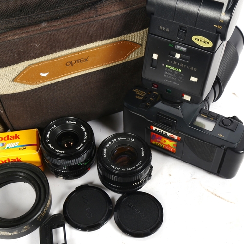 70 - CANON - a Vintage T70 single lens film camera, with Canon 70-210mm 1:4 zoom lens, 28mm and 50mm lens... 