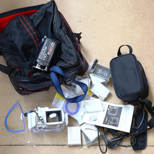 79 - Sony HD Handycam, Lumix Panosonic waterproof marine case, and softshell carrying case