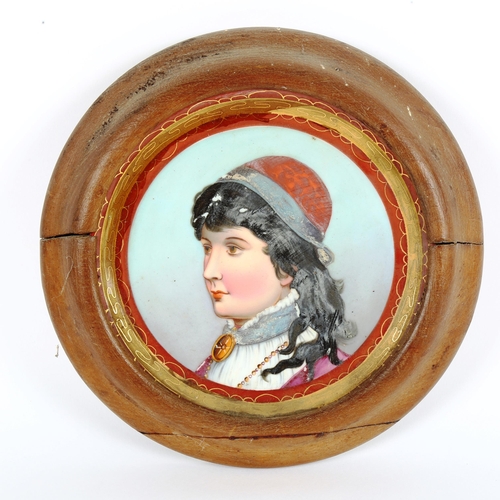 81 - An Italian hand painted and gilded porcelain plaque, framed, overall 22cm