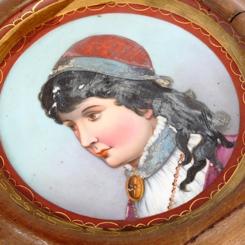 81 - An Italian hand painted and gilded porcelain plaque, framed, overall 22cm