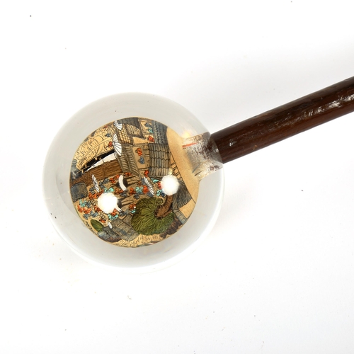 85 - A Chinese walking stick with internally painted glass globe handle, handle diameter approx 7.5cm