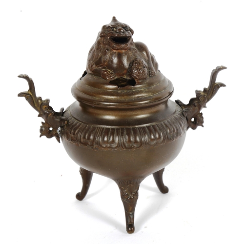 89 - A Chinese patinated bronze incense burner and cover, height 19cm