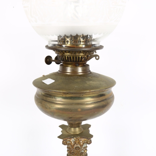 322 - An early 20th century Duplex brass Corinthian column oil lamp, with glass funnel and shade, height 8... 