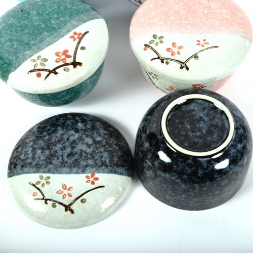 451 - A set of 5 Japanese ceramic food bowls and covers, with floral designs, 12cm across