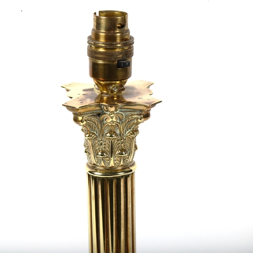 458 - A Corinthian column brass table lamp, with acanthus leaf decoration, 34cm