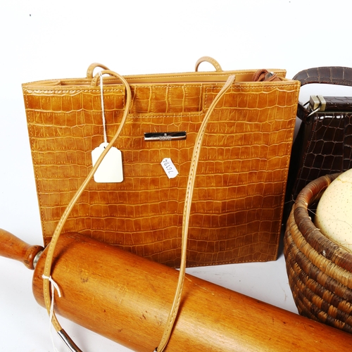 476 - A large rolling pin, 2 leather handbags, 1 marked Gucci, a belt, an ostrich egg (A/F) etc