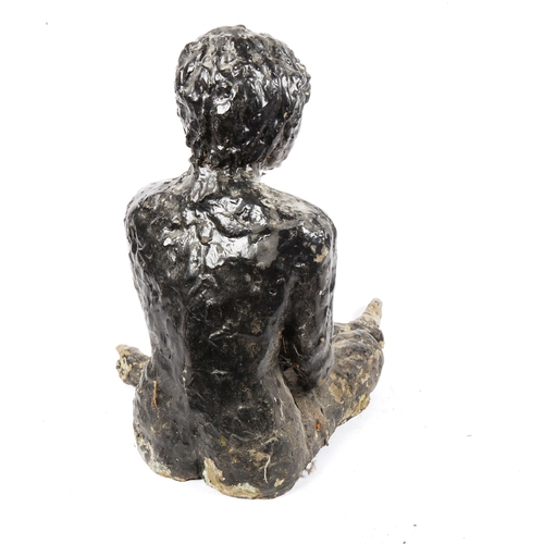 479 - A painted plaster sculpture of a seated woman, height 44cm