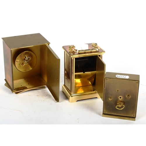 487 - A brass carriage clock with quartz movement, and 2 other brass clocks