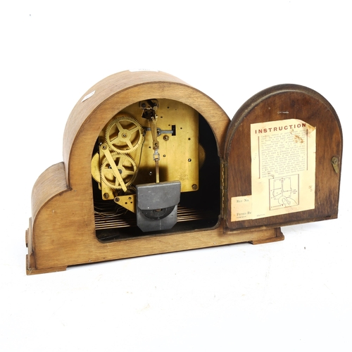 502 - An oak-cased Art Deco 3-train mantel clock, height 22cm