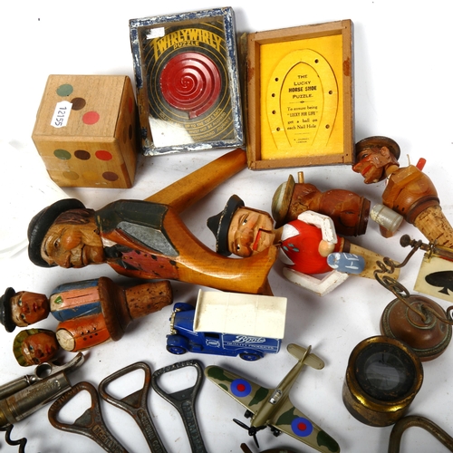 516 - Carved wood bottle openers, nutcracker etc