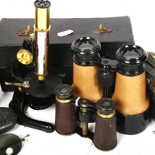 517 - Binoculars in case, opera glasses in case, spectacles, and a cased Octopus microscope