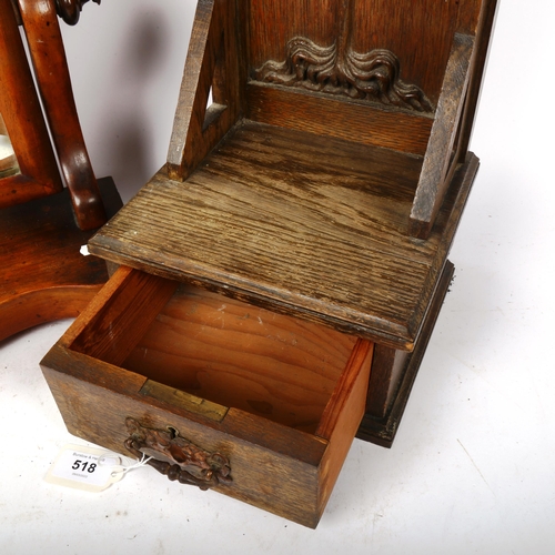 518 - An Antique swing toilet mirror, height 38cm, and a carved oak box in the form of a high backed chair