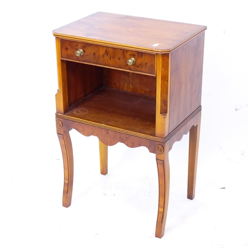 2058 - A reproduction yew wood lamp stand, with drawer and open shelf under, on sabre leg, W43cm, H78cm, D3... 