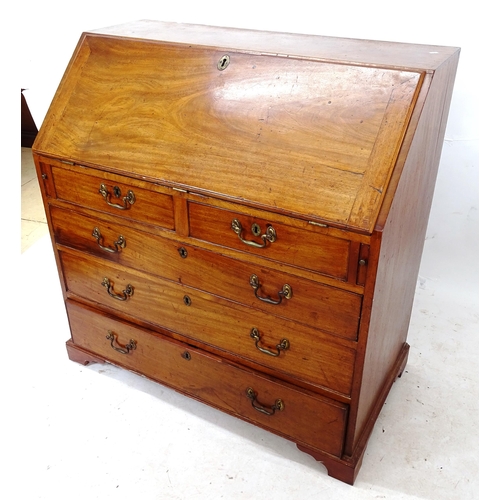 2062 - A Georgian mahogany bureau with fitted interior, with 2 short and 3 long drawers below, W110cm, H110... 