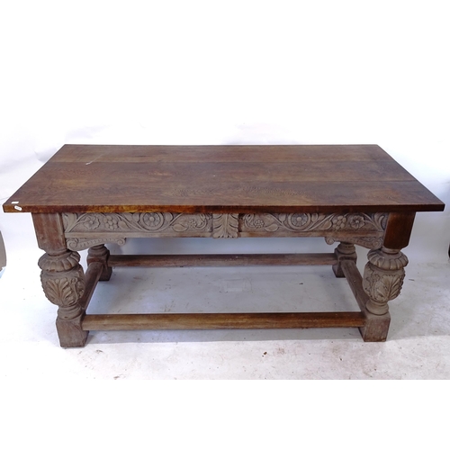 2066 - An Antique oak plank-top rectangular dining table, on baluster legs with relief carved decoration, L... 