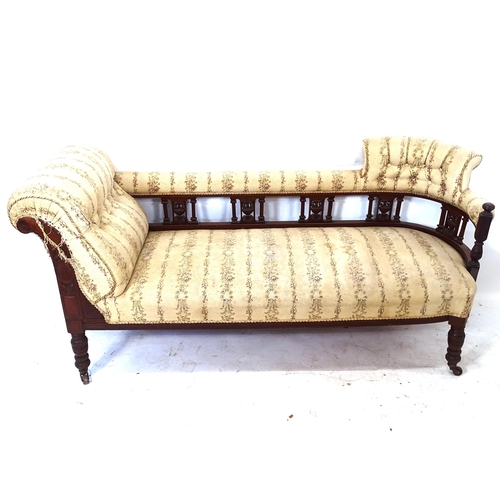 2067 - An Edwardian carved walnut and upholstered chaise longue, L168cm