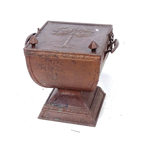 2081 - An Arts and Crafts brass and copper coal box, on pedestal base, W48cm, H50cm