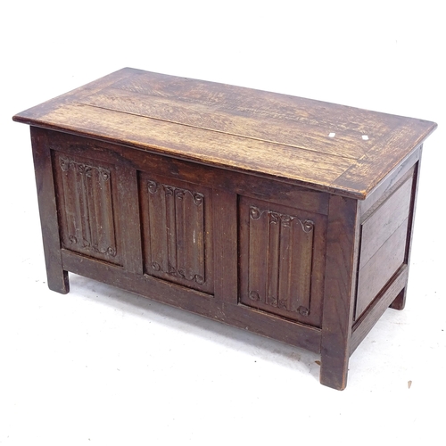 2087 - A stained oak coffer with panelled front, W91cm, H50cm, D46cm