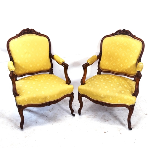 2089 - A pair of Continental open arm walnut-framed salon chairs