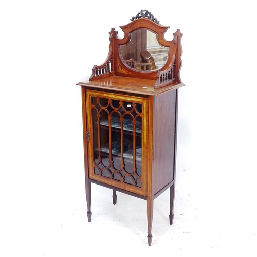 2092 - An Edwardian mahogany satinwood-banded and inlaid mirror-back music cabinet, with single-glazed door... 