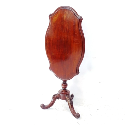 2121 - A 19th century mahogany tilt-top wine table, with shaped top, on tripod legs, L80cm, H75cm (increasi... 